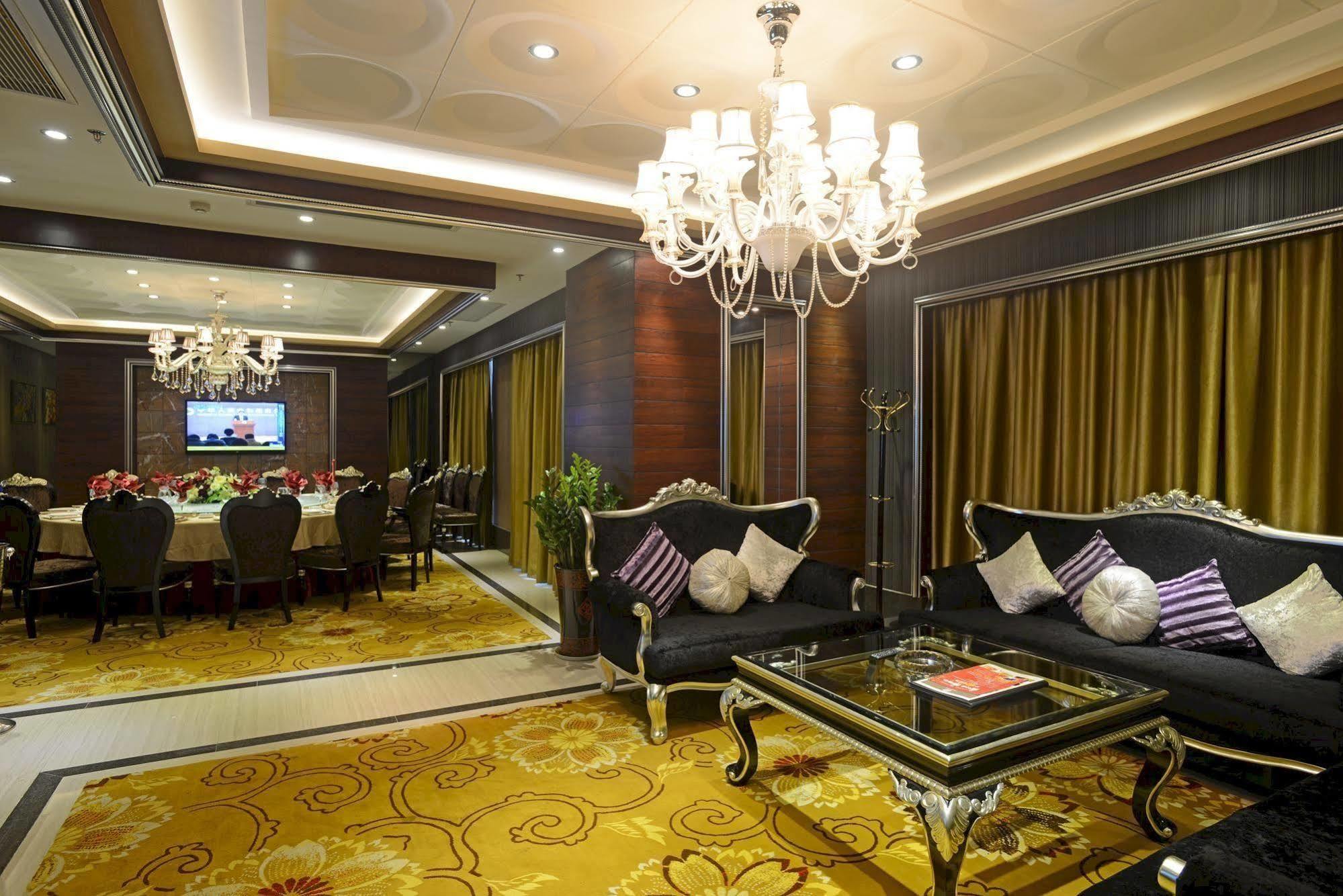 Wenhua Herton Hotel Qionghai Bagian luar foto