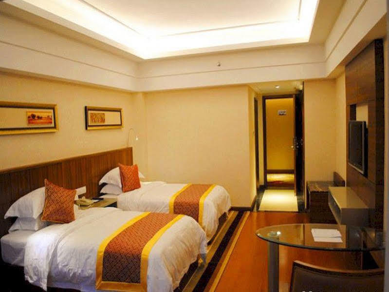 Wenhua Herton Hotel Qionghai Bagian luar foto